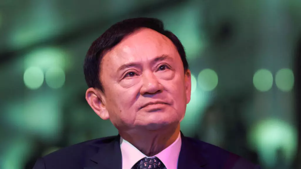 Thaïlande: accusé de lèse-majesté, l'ex-Premier ministre Thaksin Shinawatra entendu au tribunal